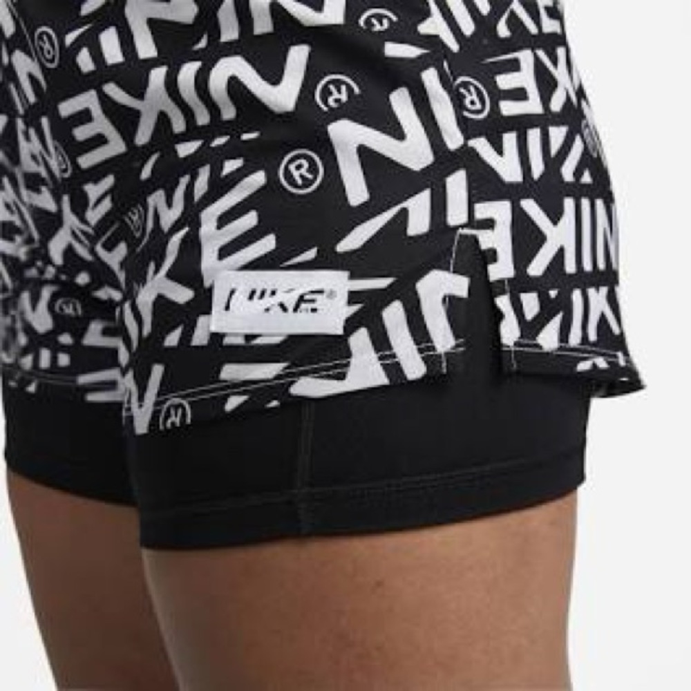 Nike women’s Dri-Fit ONE 2 in 1 running short. Nike print size Large